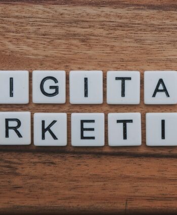 digital marketing artwork on brown wooden surface